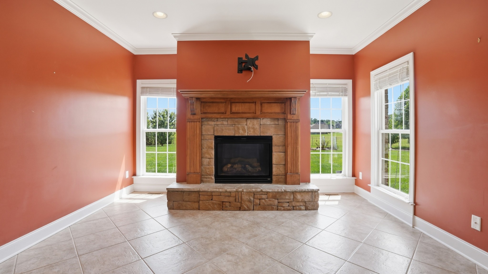 292 Ridgecrest Drive Winchester, TN 37398 - Photo 23 of 62 a living room with a fireplace and a floor to ceiling window