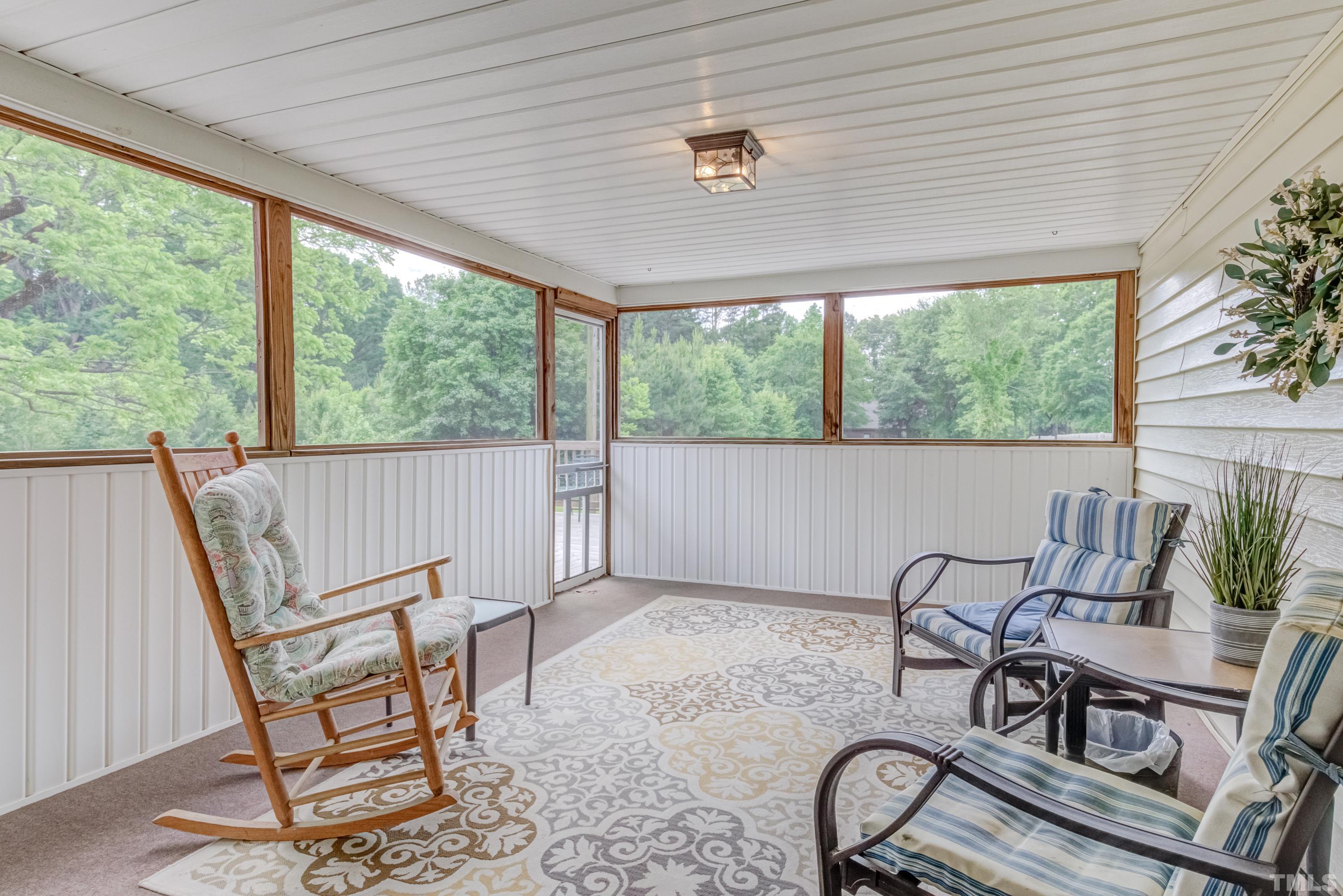 8837 Ransdell Road Raleigh, NC 27603 - Photo 35 of 48 a view of a dining room with furniture window and outside view