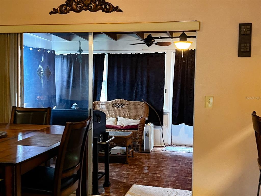 366 Diamond Street Deltona, FL 32725 - Photo 12 of 24 a view of a room that has a table and chairs in it