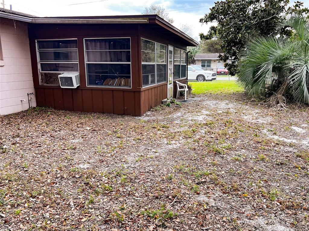 366 Diamond Street Deltona, FL 32725 - Photo 8 of 24 a view of a house with a swimming pool