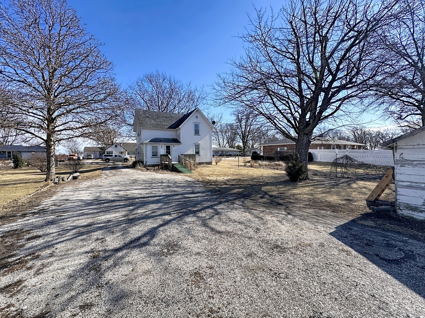 108 South Yates Street Alpha, IL 61413 - Photo 15 of 15 a view of a yard with snow on the road
