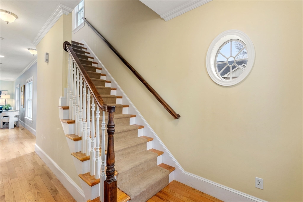 18 Maple Court, Unit 18 Needham, MA 02492 - Photo 11 of 25 a view of entryway with wooden floor