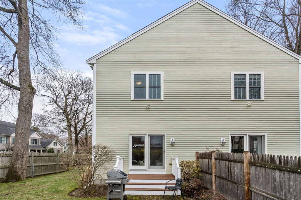 18 Maple Court, Unit 18 Needham, MA 02492 - Photo 23 of 25 a view of house with a street