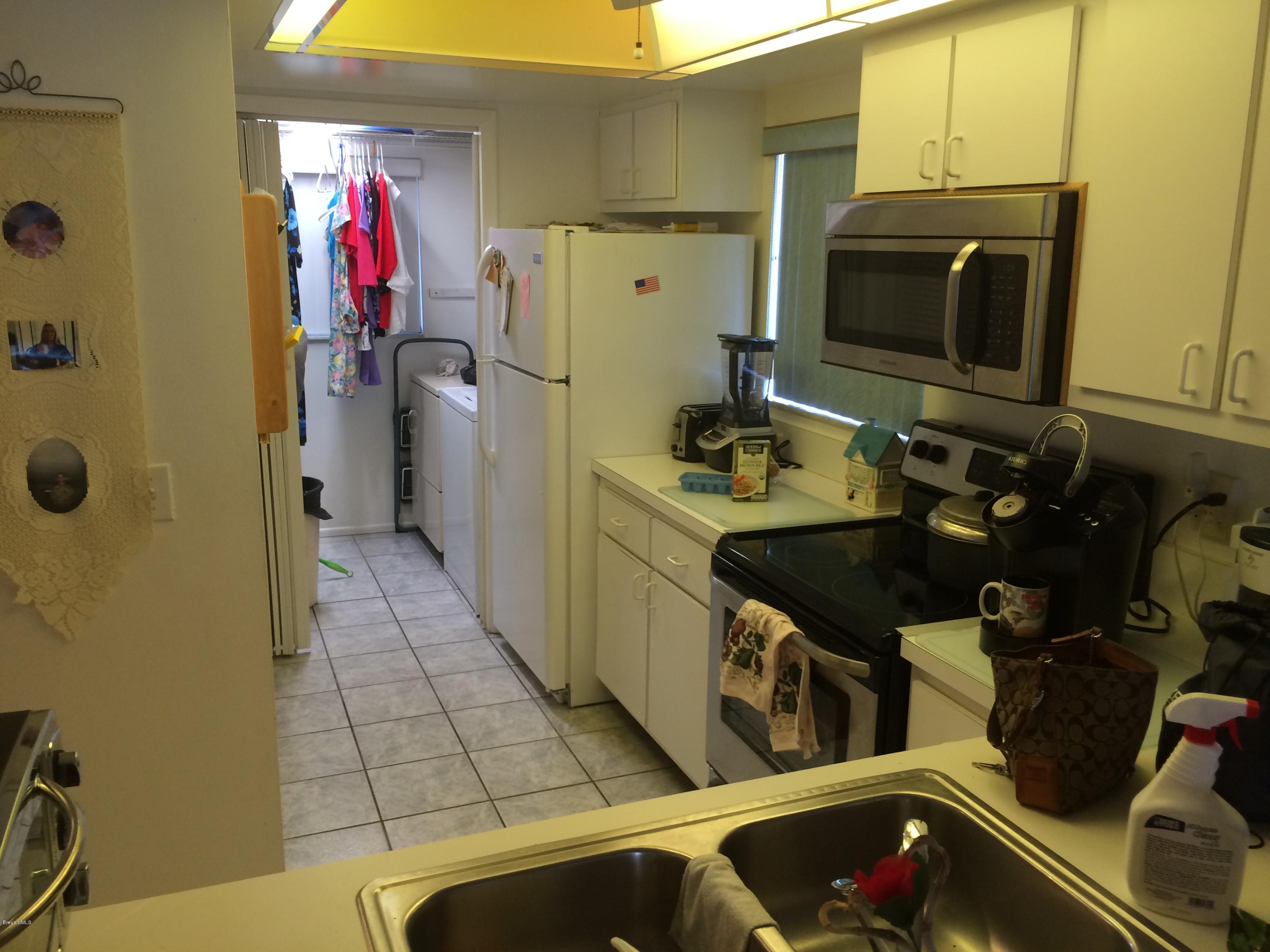 2775 North Wickham Road, Unit 201 Melbourne, FL 32935 - Photo 3 of 11 IMG_3828