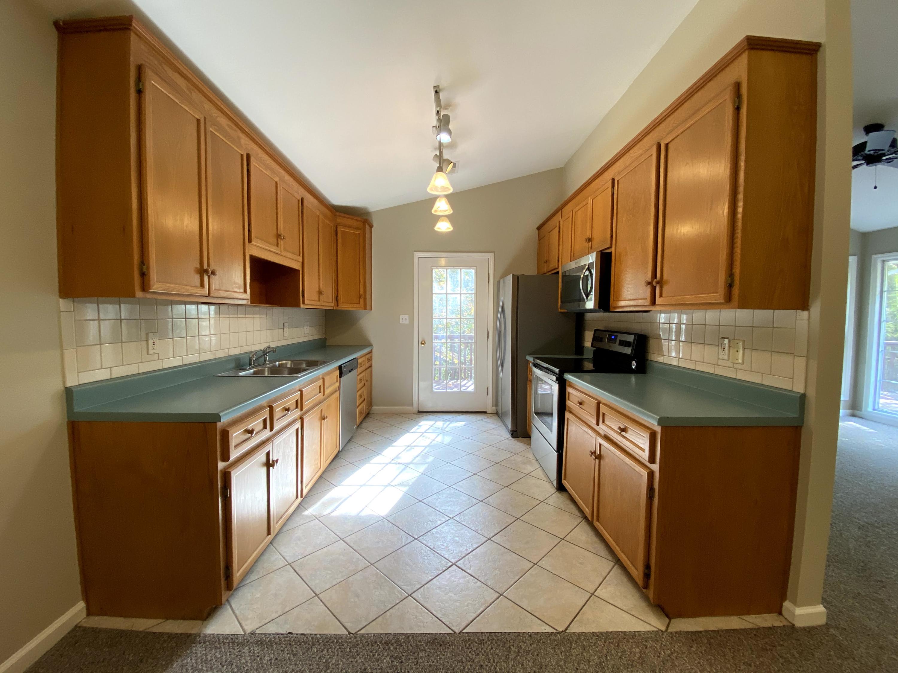 35 Silver Lake Road Hardy, VA 24101 - Photo 11 of 47 a kitchen with stainless steel appliances granite countertop a stove a sink and a microwave