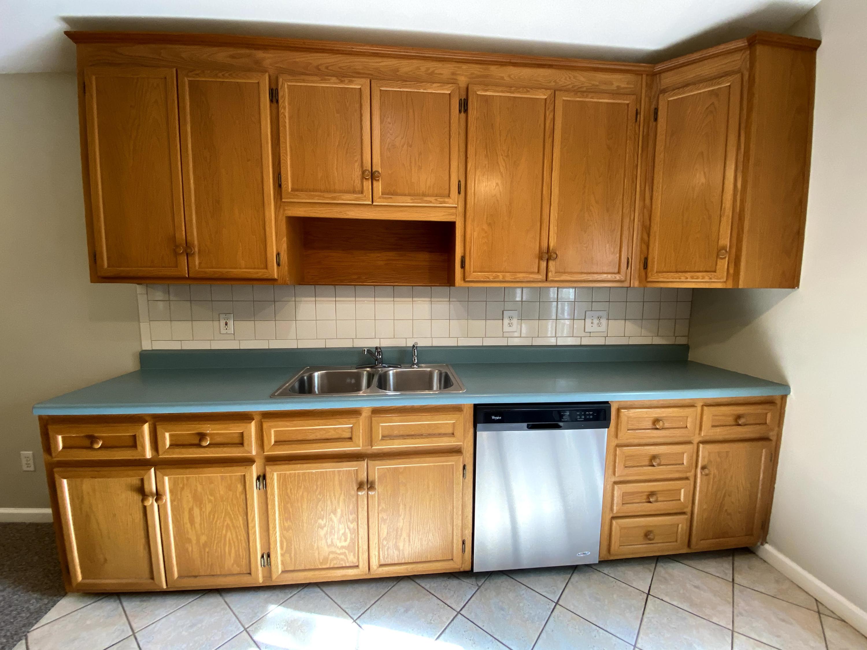 35 Silver Lake Road Hardy, VA 24101 - Photo 13 of 47 a kitchen with stainless steel appliances granite countertop wood cabinets and a sink