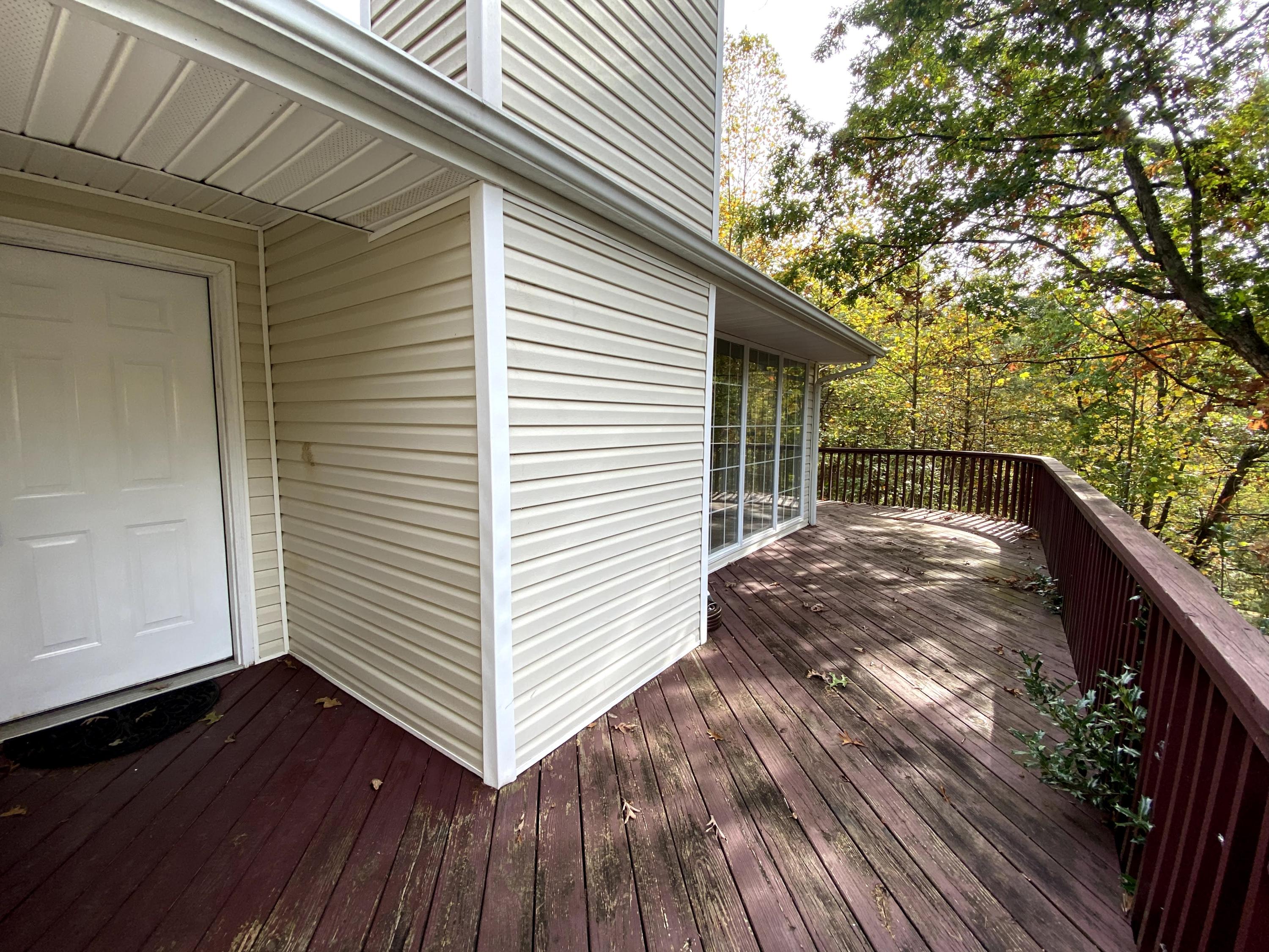 35 Silver Lake Road Hardy, VA 24101 - Photo 3 of 47 a view of a backyard with a deck