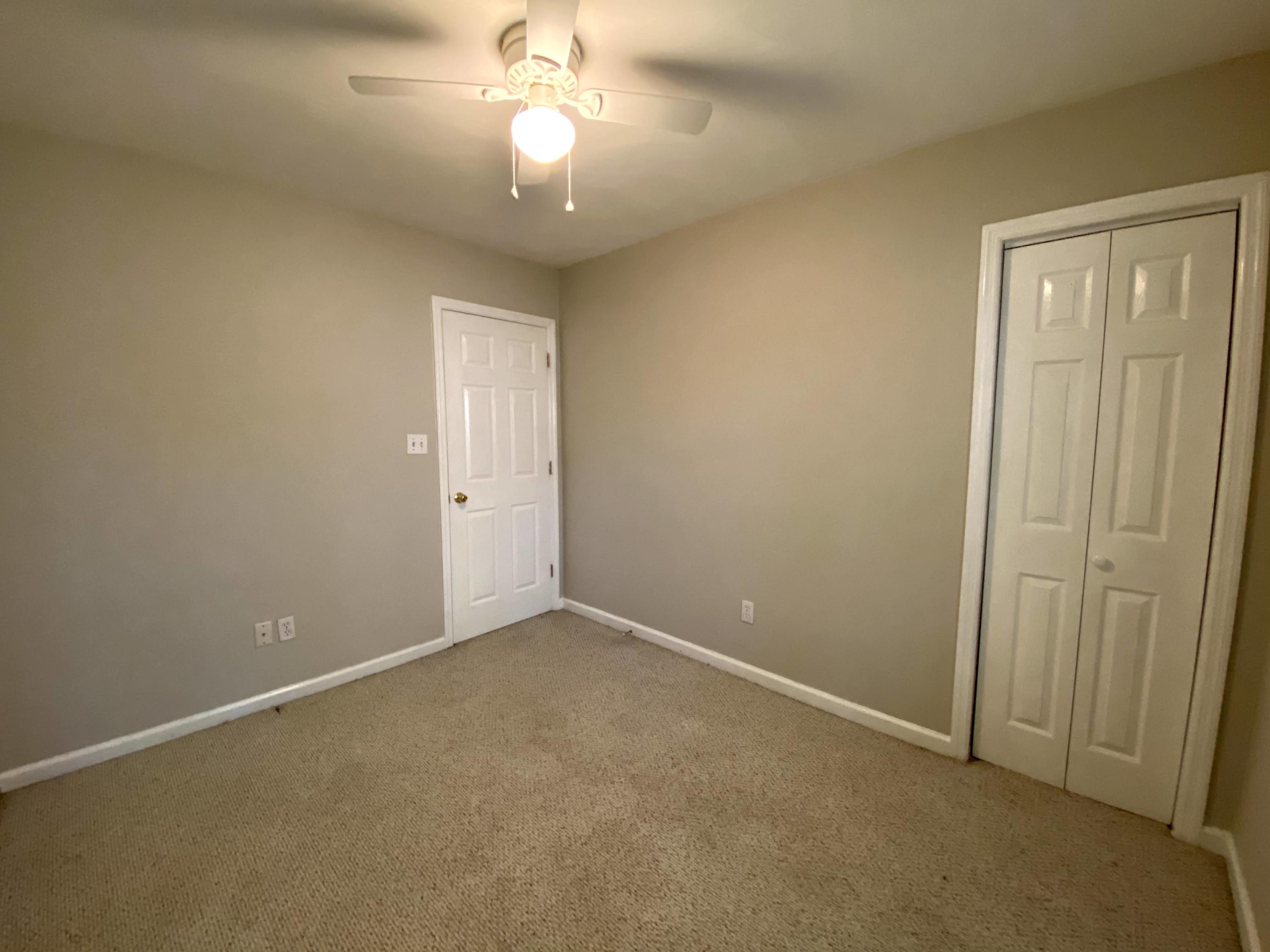 35 Silver Lake Road Hardy, VA 24101 - Photo 23 of 47 an empty room with a chandelier fan