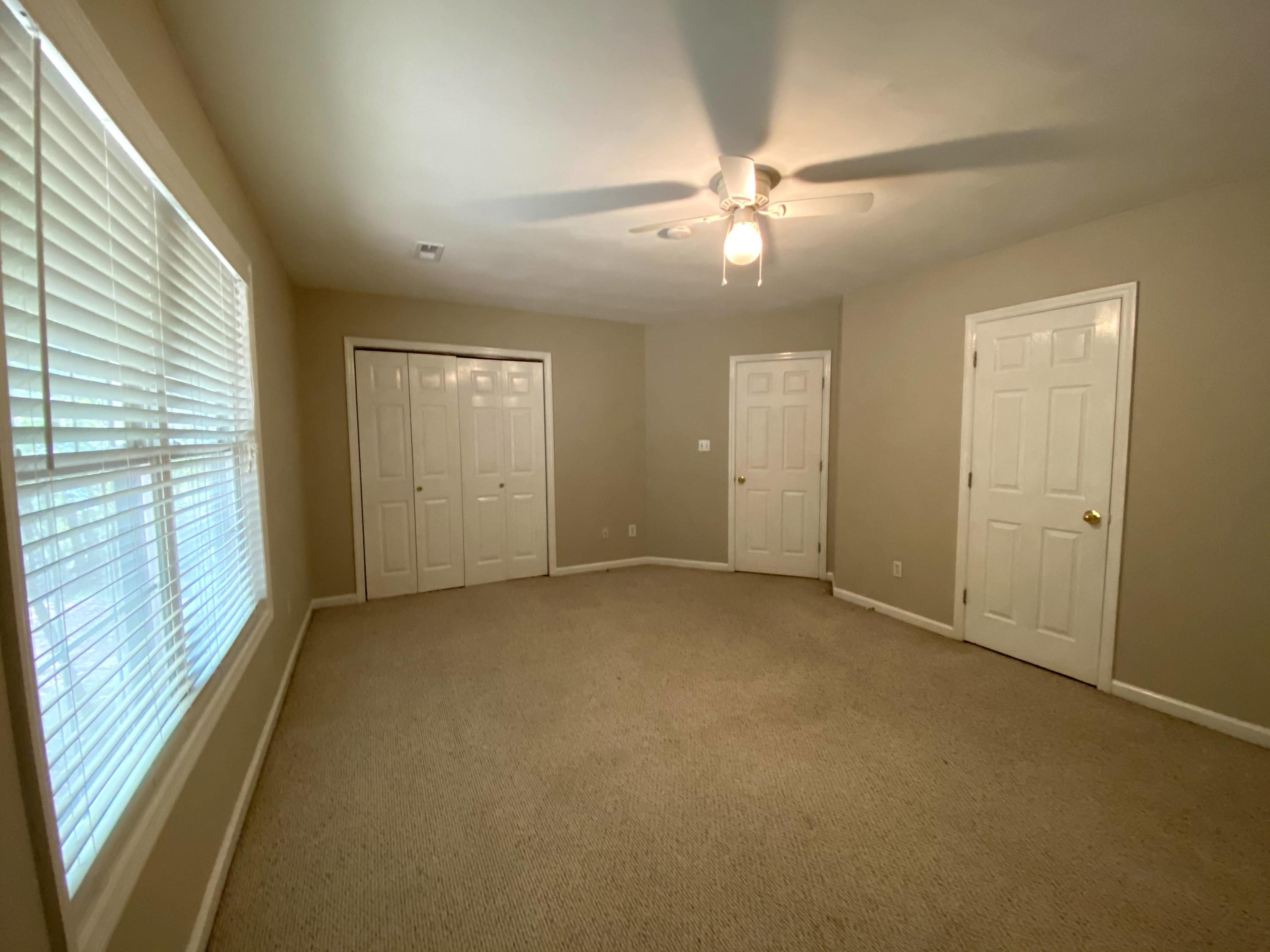 35 Silver Lake Road Hardy, VA 24101 - Photo 27 of 47 an empty room with chandelier fan and windows