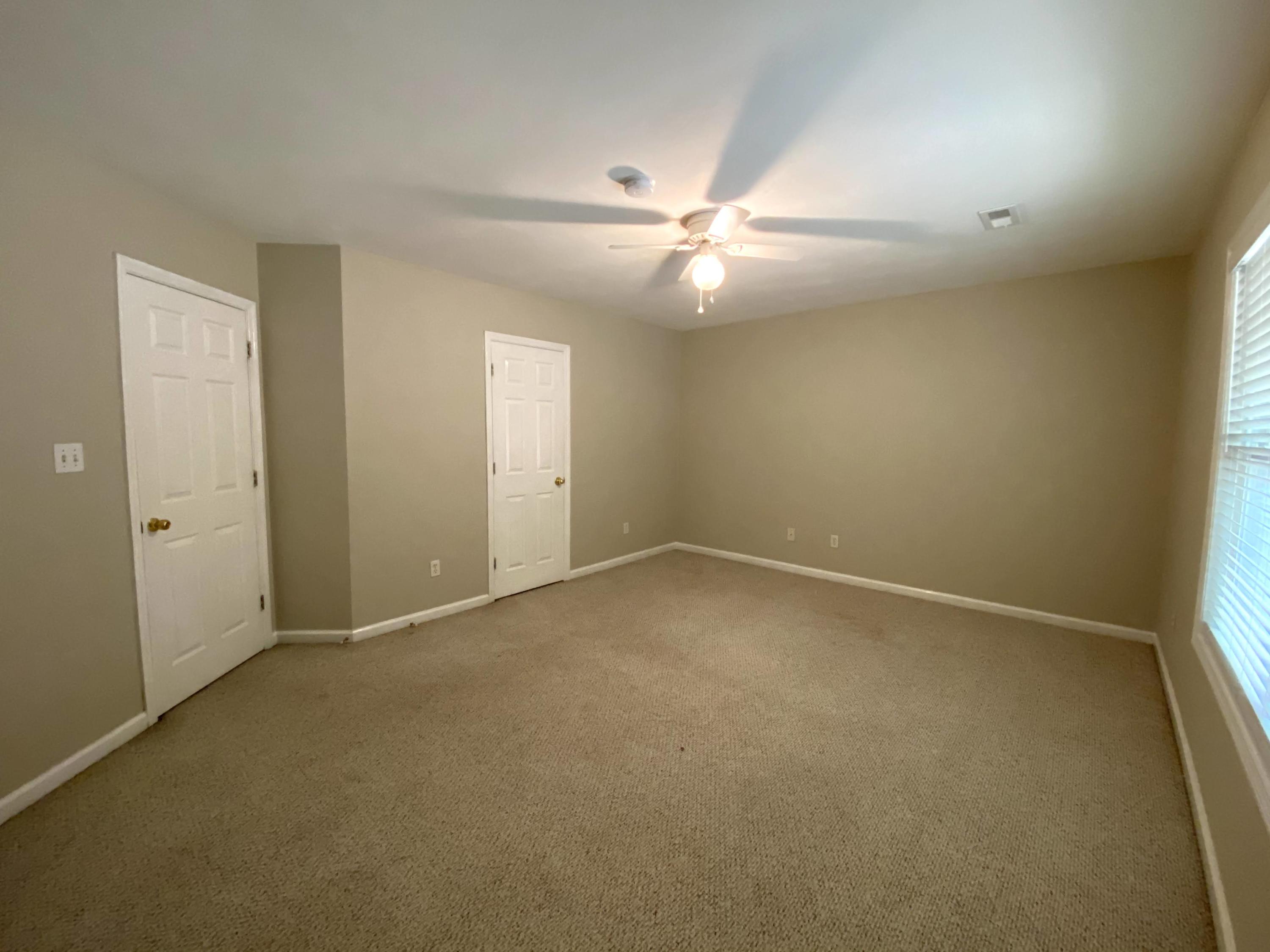 35 Silver Lake Road Hardy, VA 24101 - Photo 28 of 47 an empty room with a ceiling fan and a window