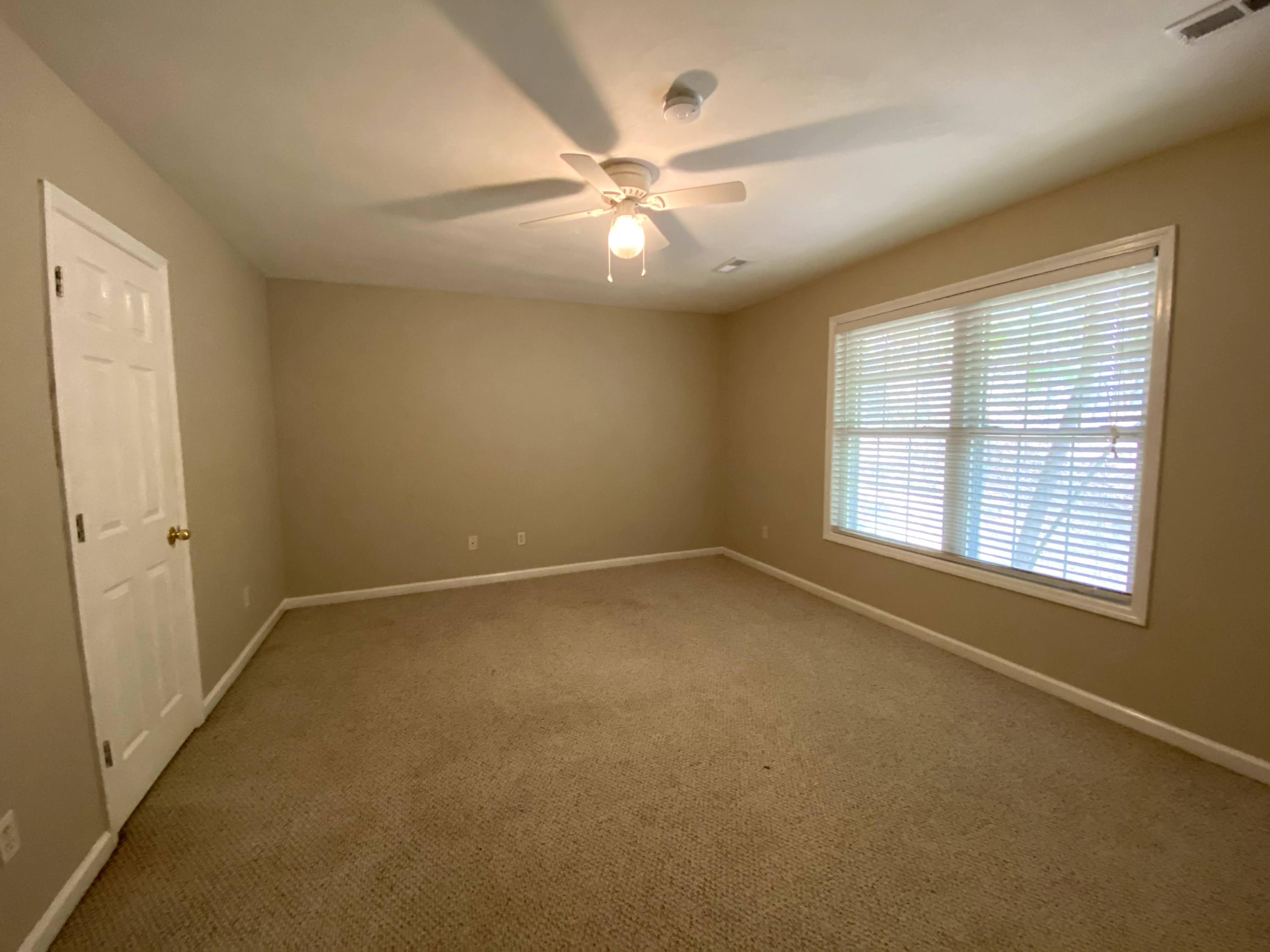 35 Silver Lake Road Hardy, VA 24101 - Photo 29 of 47 an empty room with a window and a ceiling fan
