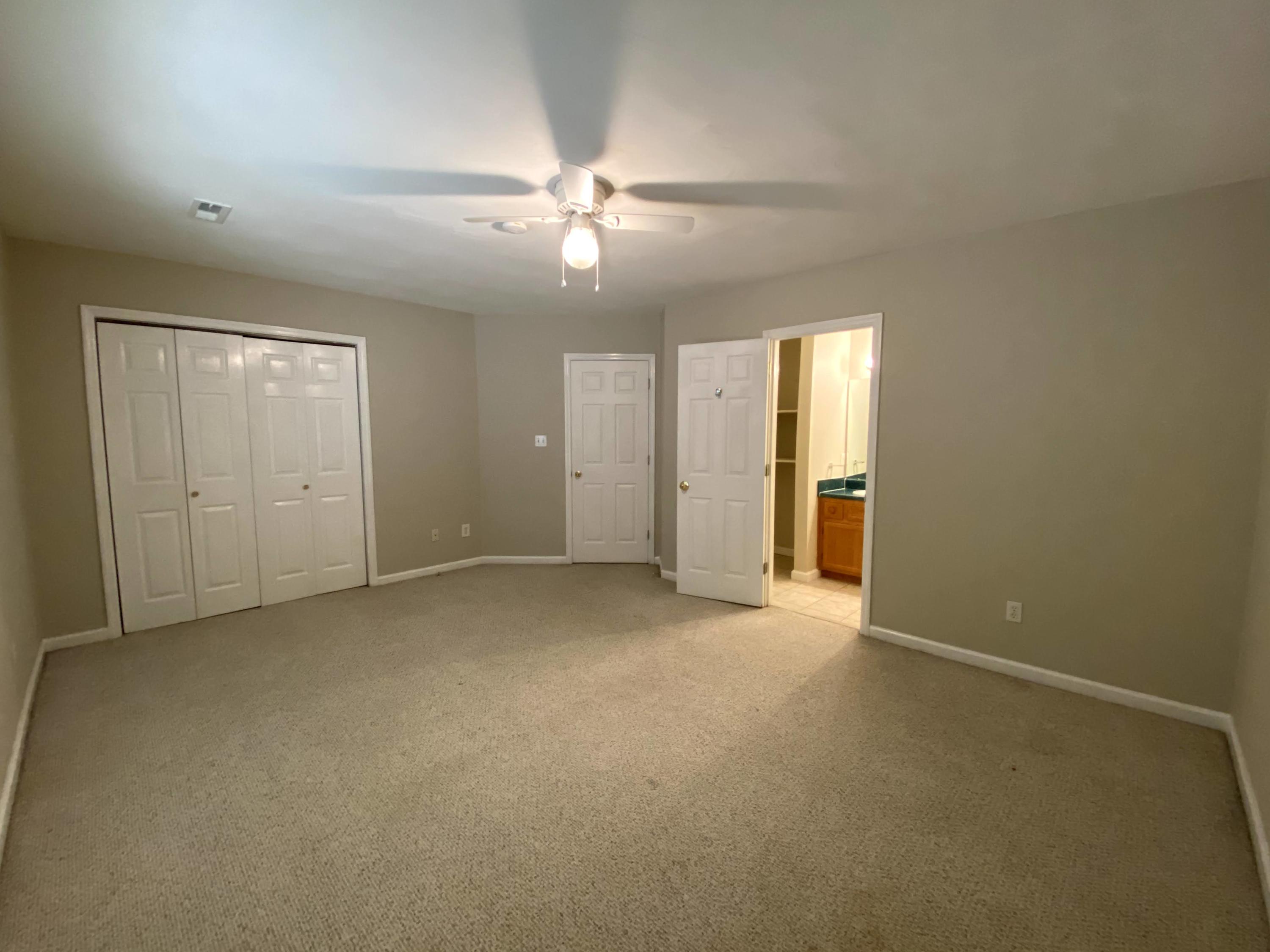 35 Silver Lake Road Hardy, VA 24101 - Photo 31 of 47 an empty room with chandelier fan and windows