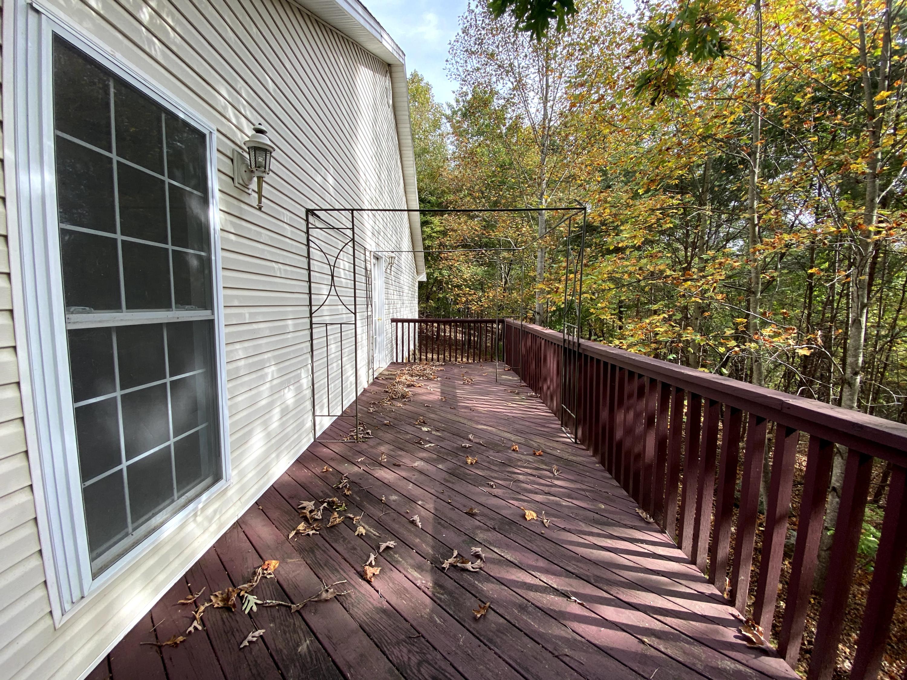 35 Silver Lake Road Hardy, VA 24101 - Photo 46 of 47 a view of balcony with wooden floor and fence