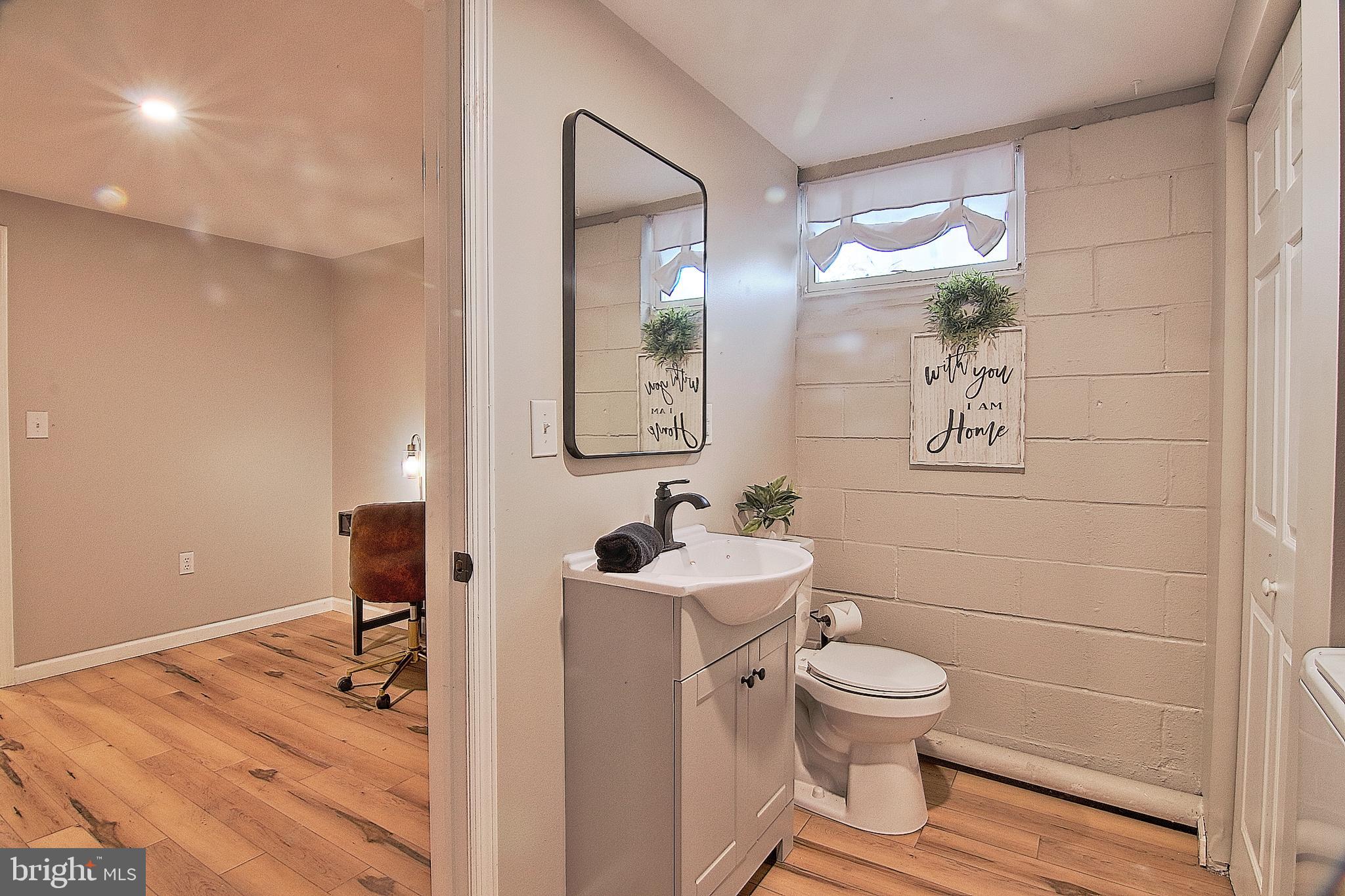 1291 Shelbourne Road Reading, PA 19606 - Photo 24 of 34 Half Bath & Laundry