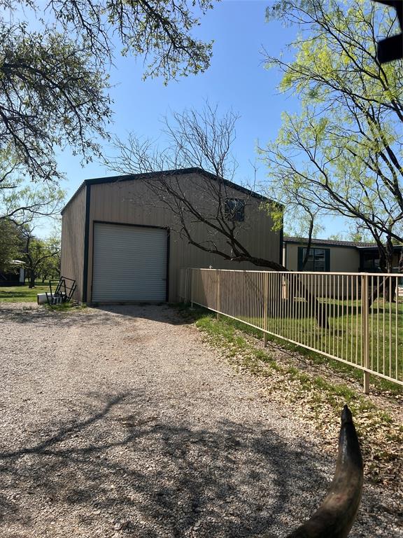 3370 Surfside Drive May, TX 76857 - Photo 6 of 28 a backyard of a house with lots of green space