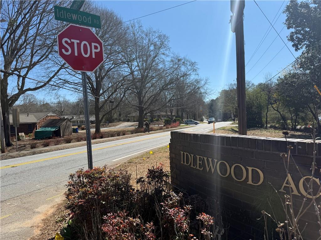 3965 Camelot Court Tucker, GA 30084 - Photo 3 of 3 a view of a street sign on a sidewalk