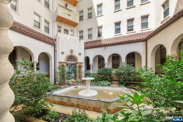 a front view of a multi story residential apartment building