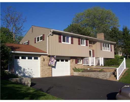 281 Foster Road New Brighton, PA 15066 - Photo 1 of 18 Exterior Front. VERY WELL MAINTAINED THREE BEDROOM SPLIT WITH TWO ATTACHED GARAGE ON A NICE MANICURED LOT!