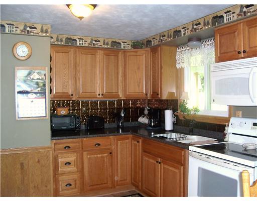 281 Foster Road New Brighton, PA 15066 - Photo 5 of 18 Kitchen. 15X11 EAT-IN-KITCHEN FULLY REMODELED. APPLAINCES INCLUDE ELECTRIC STOVE, MICROWAVE OVEN AND REFRIGERATOR.