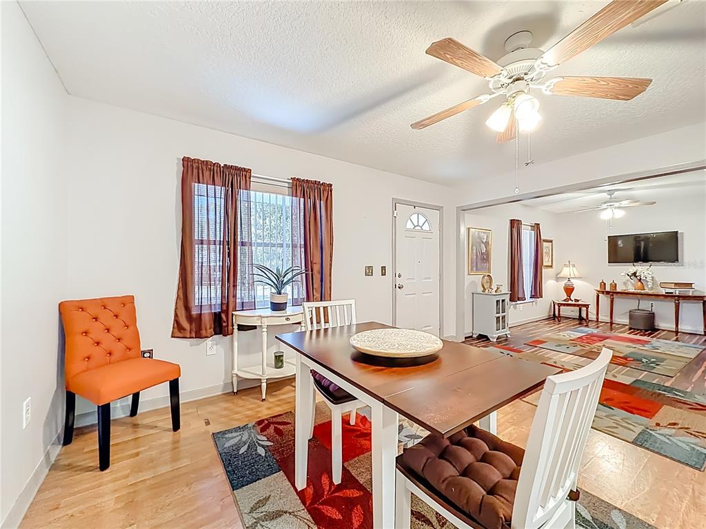 457 North Rooks Avenue Inverness, FL 34453 - Photo 16 of 61 a living room with furniture and a wooden floor