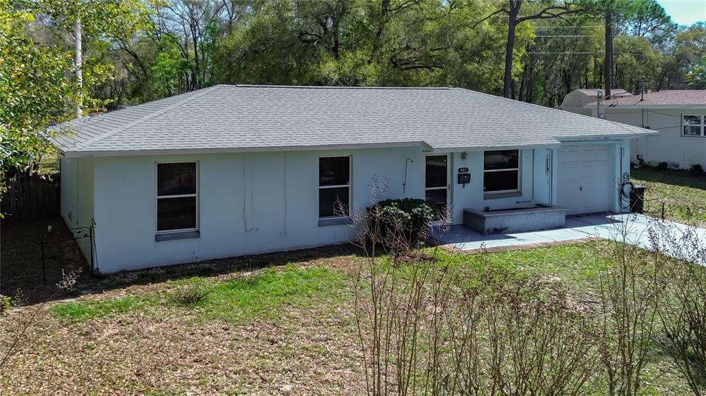 457 North Rooks Avenue Inverness, FL 34453 - Photo 2 of 61 a view of a house with backyard and garden