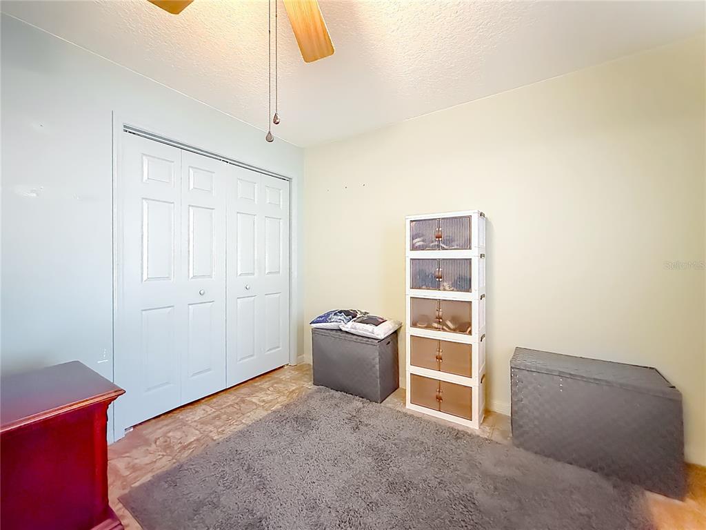 457 North Rooks Avenue Inverness, FL 34453 - Photo 23 of 61 a bedroom with a bed and a window