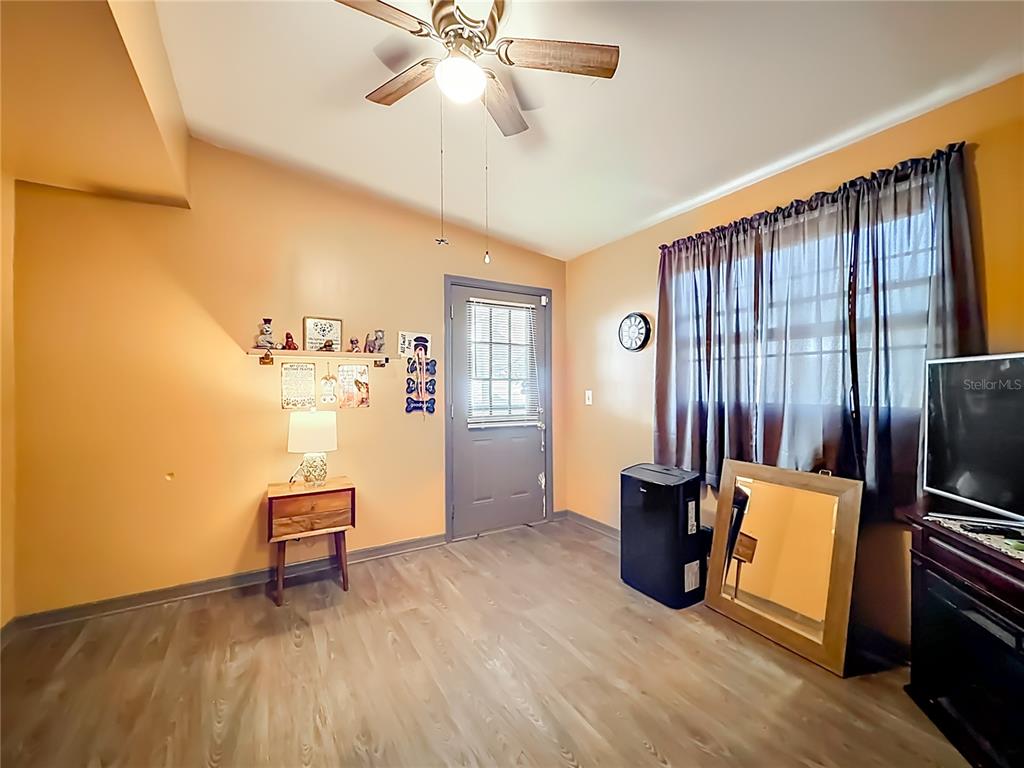 457 North Rooks Avenue Inverness, FL 34453 - Photo 25 of 61 a view of kitchen with furniture and wooden floor