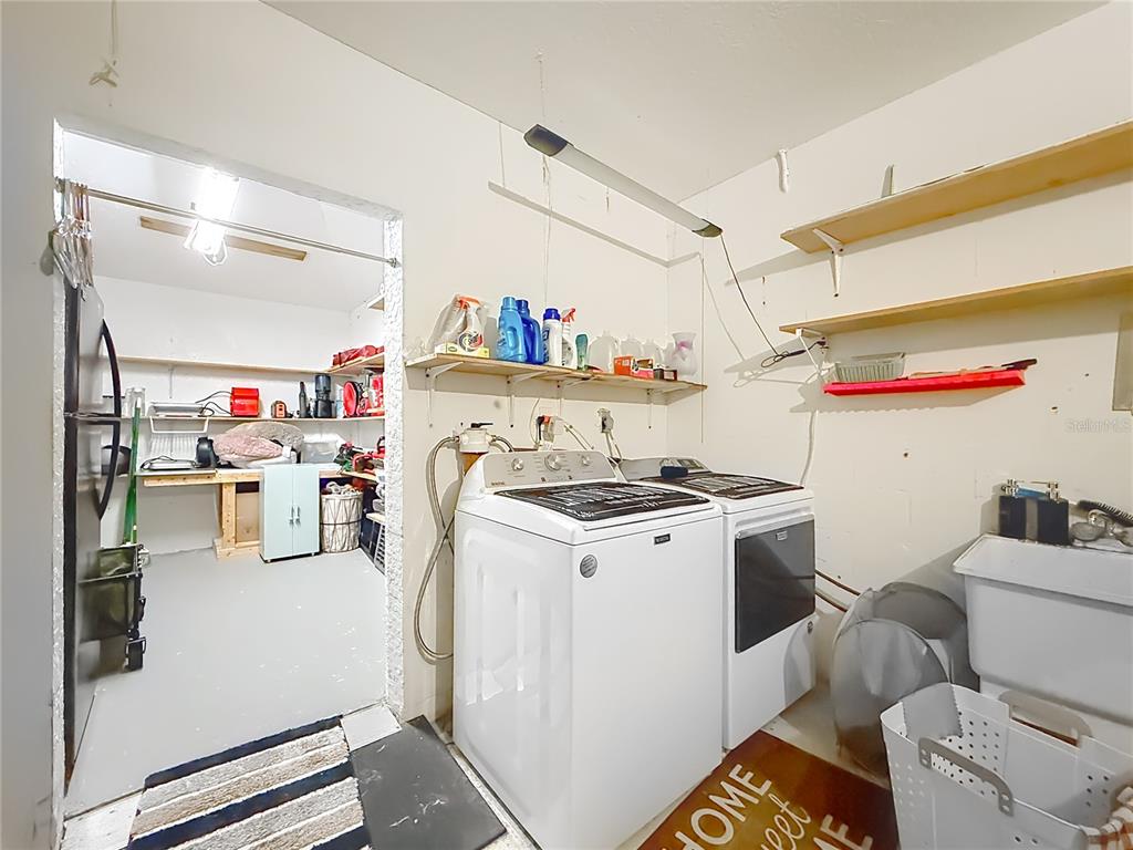 457 North Rooks Avenue Inverness, FL 34453 - Photo 38 of 61 a utility room with dryer and washer