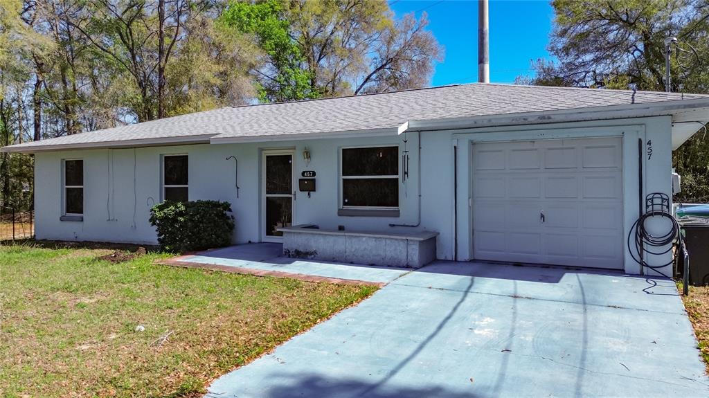 457 North Rooks Avenue Inverness, FL 34453 - Photo 5 of 61 a view of a house with backyard