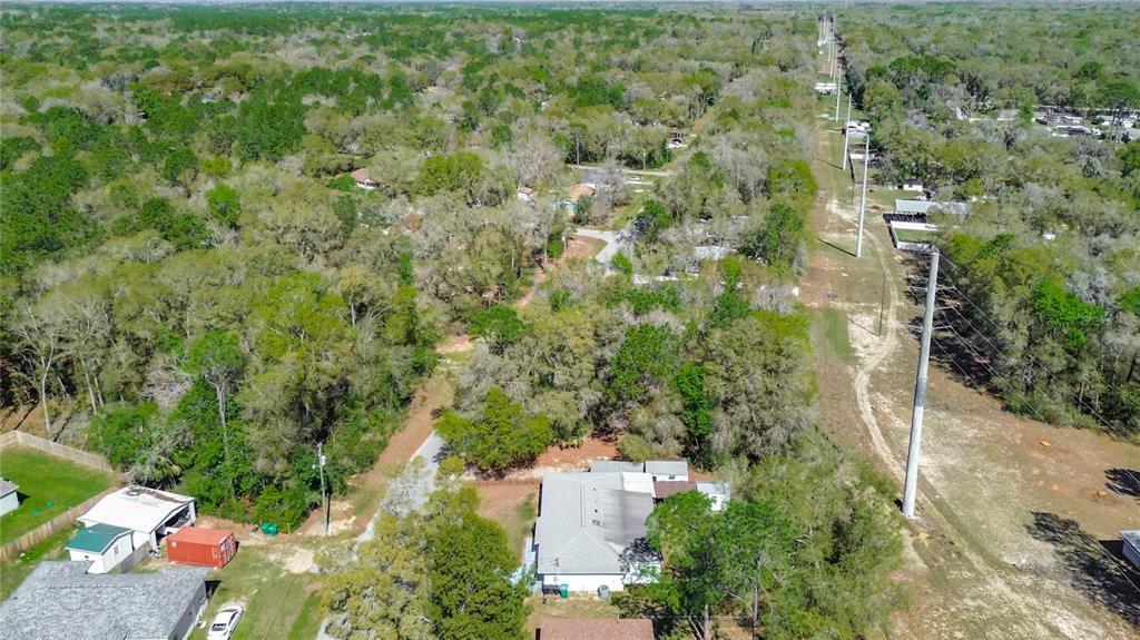 457 North Rooks Avenue Inverness, FL 34453 - Photo 55 of 61 an aerial view of a house with a yard