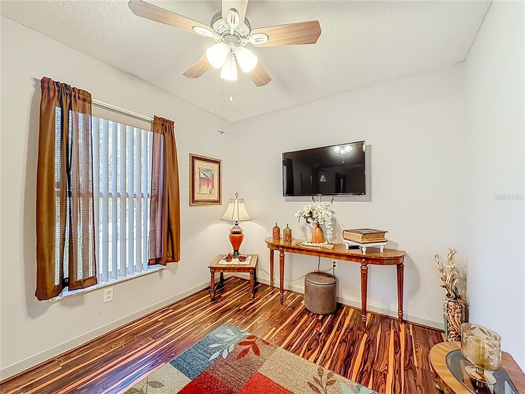 457 North Rooks Avenue Inverness, FL 34453 - Photo 10 of 61 a view of a livingroom with furniture and a flat screen tv