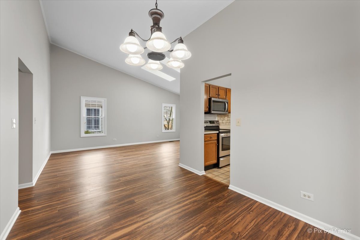 1095 Devonshire Avenue Naperville, IL 60540 - Photo 11 of 48 a view of a livingroom with wooden floor