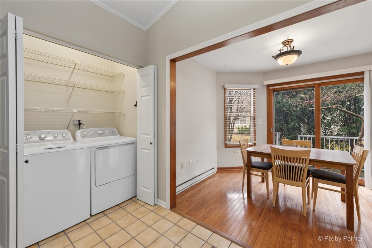1095 Devonshire Avenue Naperville, IL 60540 - Photo 18 of 48 a view of a dining room with furniture window and wooden floor