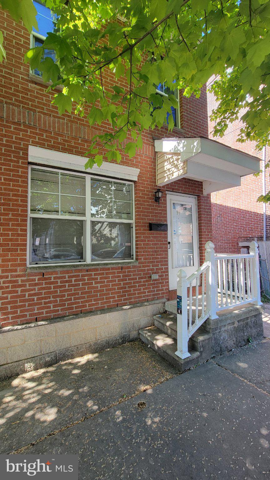 97 Spring Street Trenton, NJ 08618 - Photo 16 of 16 Charming brick facade with welcoming entry.