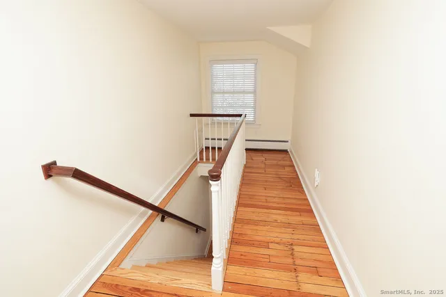 a hallway with stairs