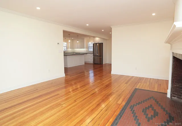 a view of kitchen dining room with wooden floor
