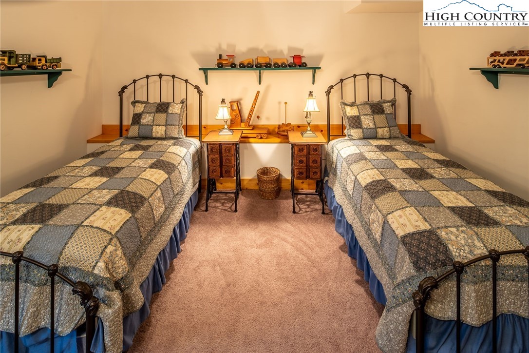 1278 Meadow Road Ferguson, NC 28624 - Photo 25 of 38 a bed room with a bed and a large window