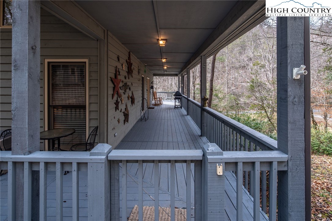 1278 Meadow Road Ferguson, NC 28624 - Photo 28 of 38 a view of entryway with wooden floor and stairs