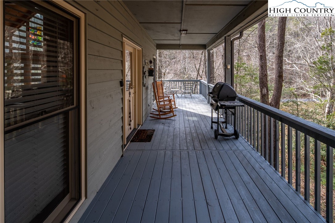 1278 Meadow Road Ferguson, NC 28624 - Photo 32 of 38 a view of a balcony with wooden floor