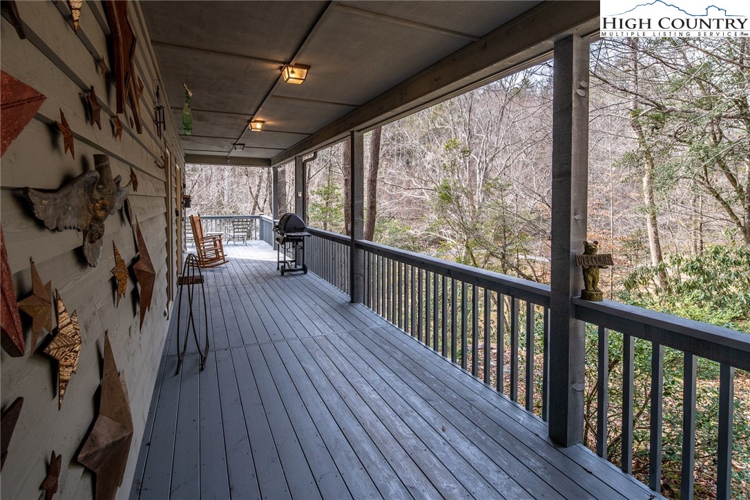 1278 Meadow Road Ferguson, NC 28624 - Photo 33 of 38 a view of a porch with wooden floor