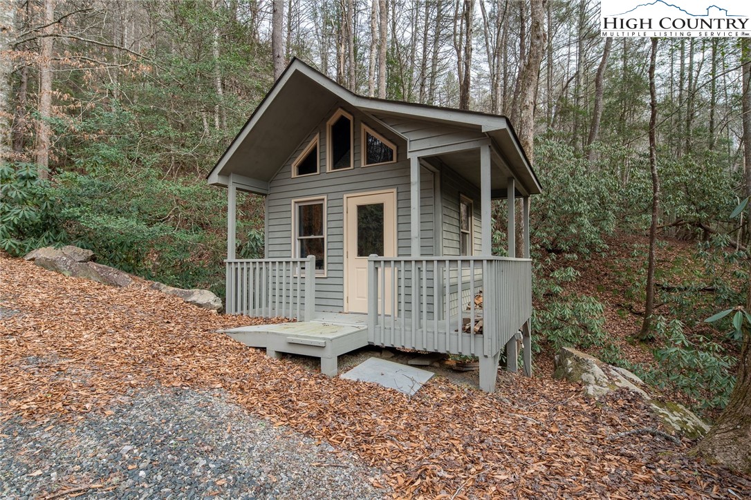 1278 Meadow Road Ferguson, NC 28624 - Photo 36 of 38 a view of a house with a yard