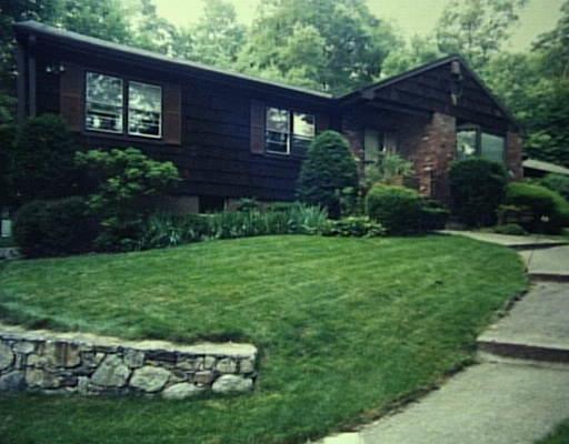 167 Wildwood Road Stamford, CT 06903 - Photo 1 of 1 a house view with a garden space