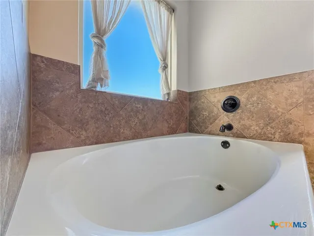 a bathroom with a tub