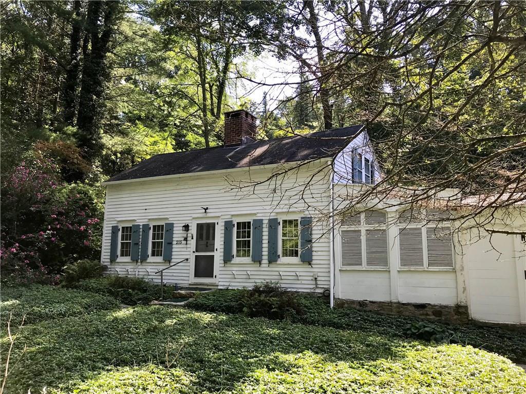 215 Gallows Hill Road Redding, CT 06896 - Photo 1 of 1 a house with trees in the background