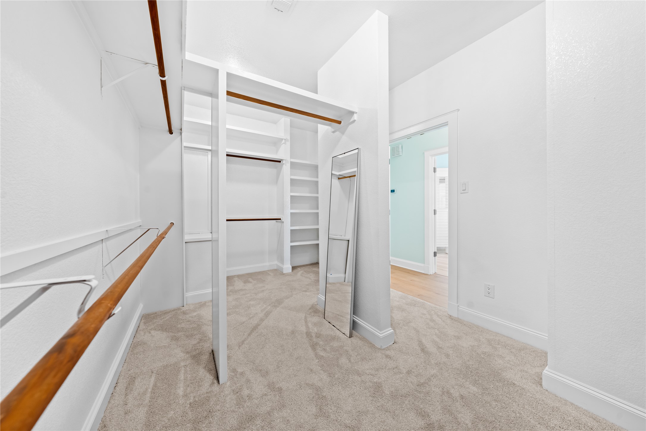 7670 Nez Perce Trace Manor, TX 78653 - Photo 12 of 40 Spacious closet with carpet flooring and visible vents