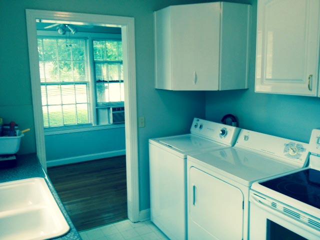 5562 Knob Road Nashville, TN 37209 - Photo 5 of 9 a utility room with a sink washer and dryer