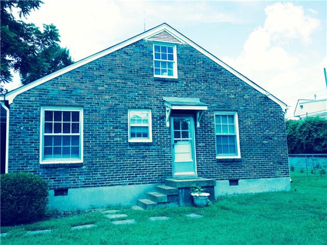 5562 Knob Road Nashville, TN 37209 - Photo 9 of 9 a front view of a house with garden