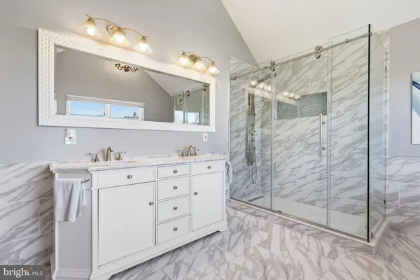 a bathroom with a bathtub and a toilet
