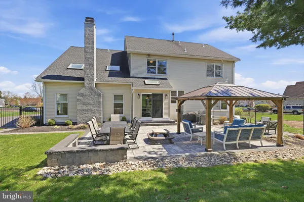 a front view of a house with patio
