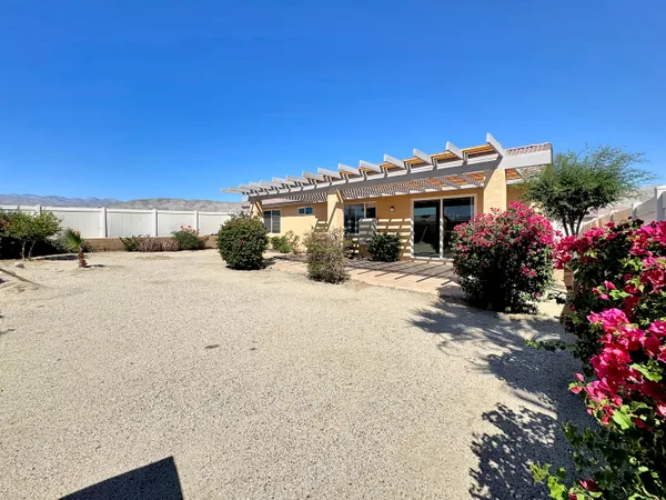 a view of a house with a patio